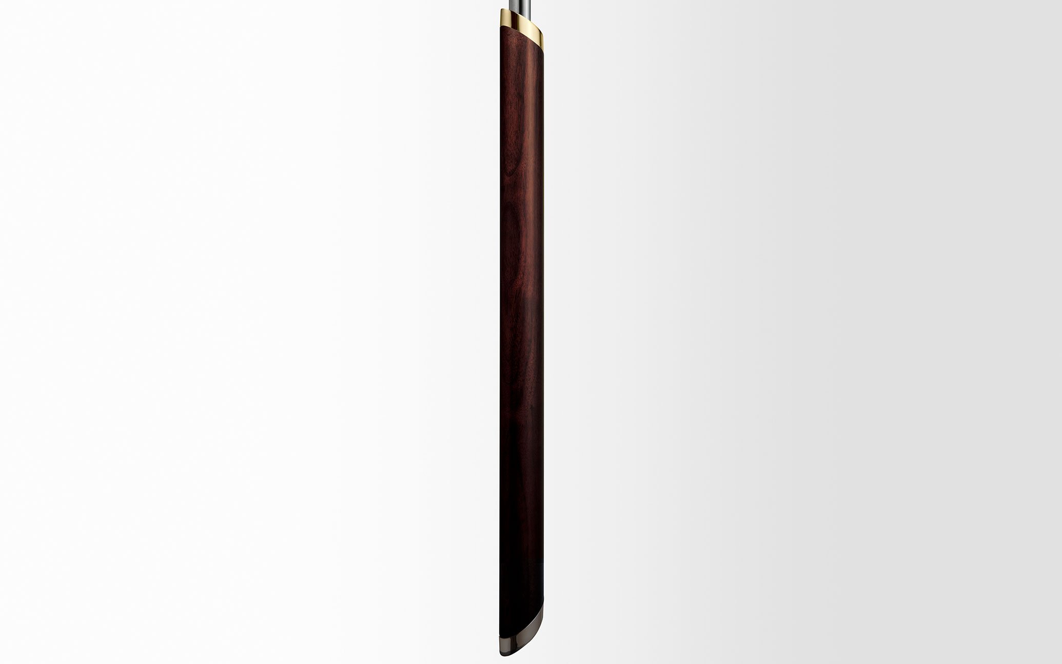 A close-up of a fan's support pole, featuring a dark wood finish with gold accents at the top and bottom.