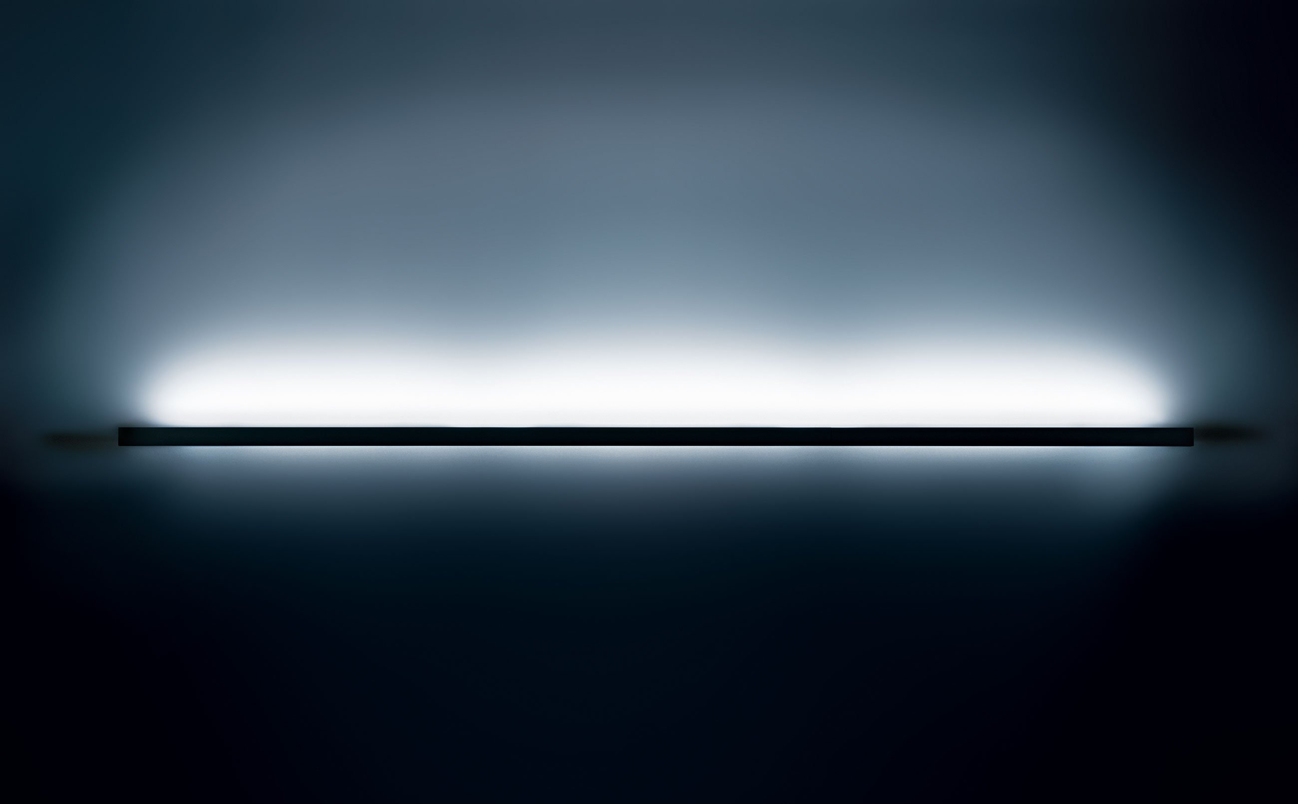 Line emission in a blue-dark space.