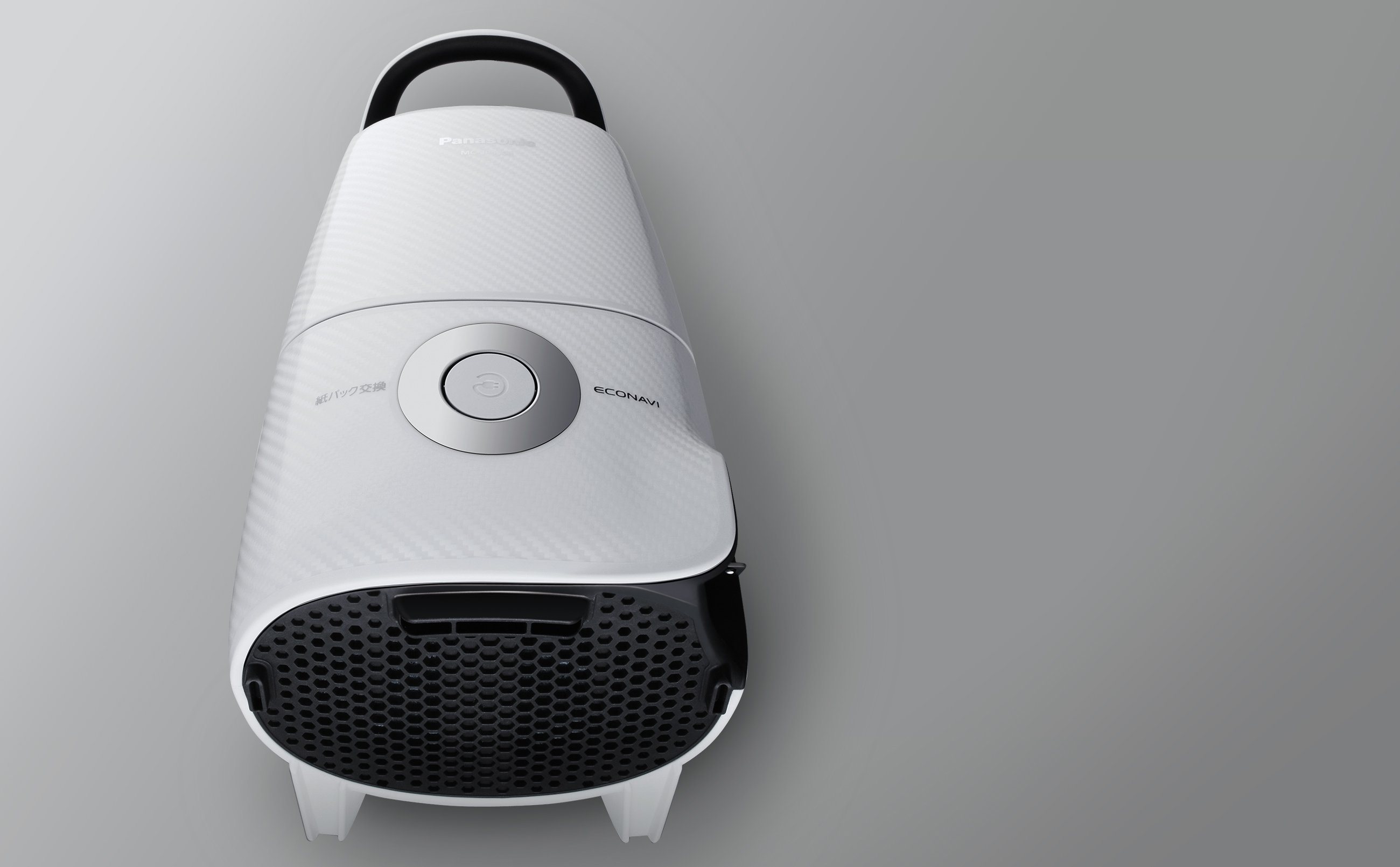 Vacuum cleaner body on left side of screen.