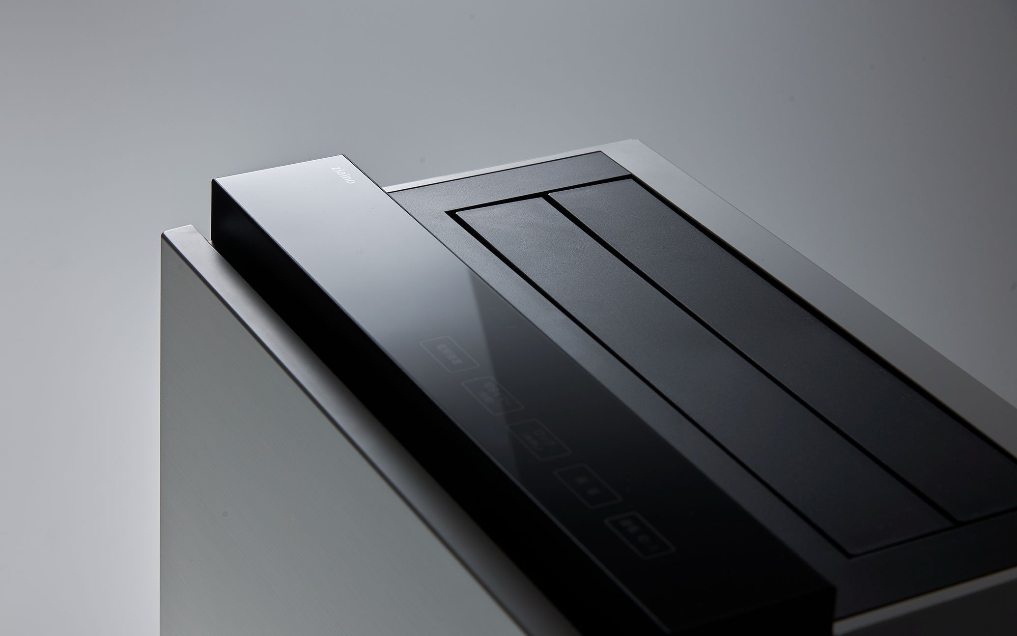 The top of the ziaino features a black control panel and a simple outlet louver design