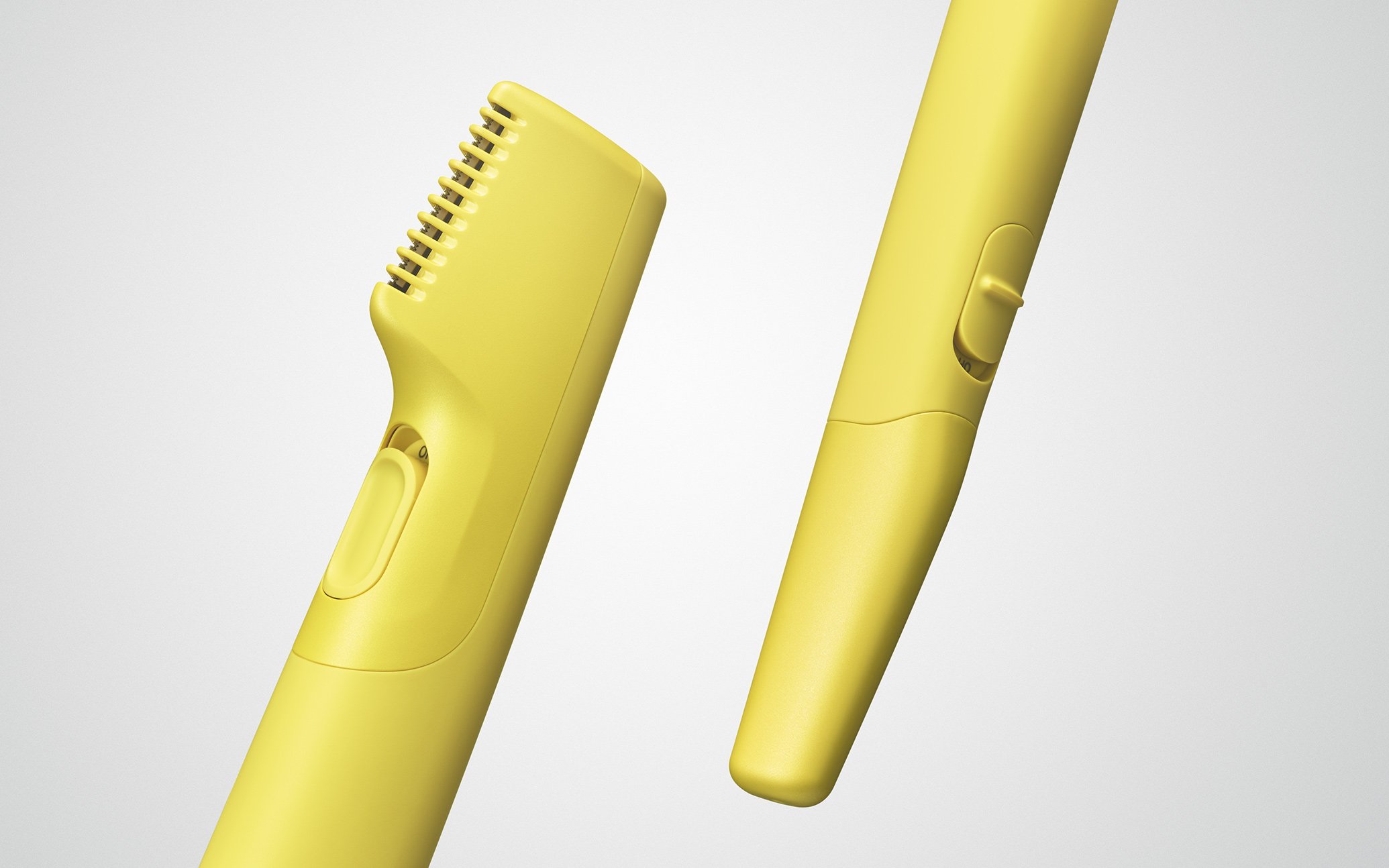 Image showing the front and side design of a yellow electric shaver and trimmer