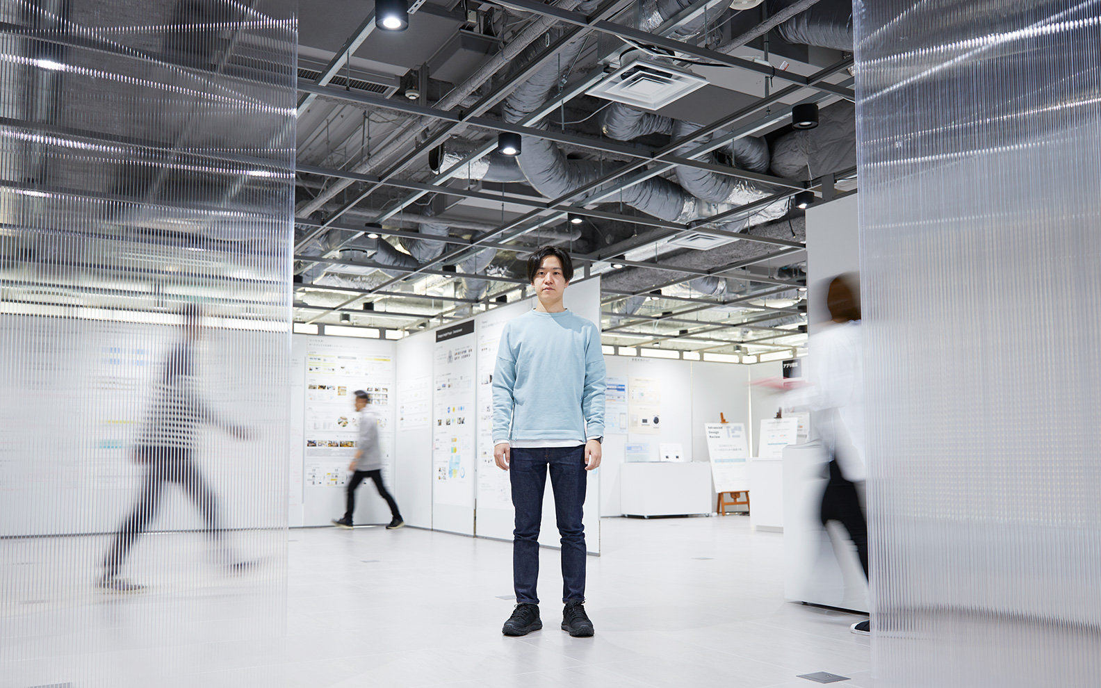 photo: Yuko Matsumoto standing on the floor of the Panasonic Design Kyoto 8F HUB