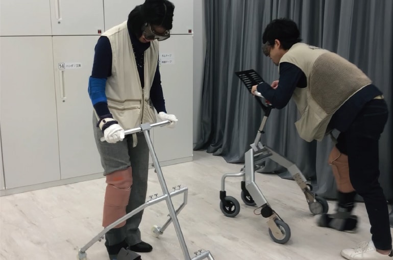 Photo: Development team testing prototypes of the walking training robot