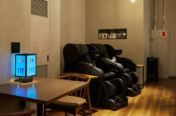 Massage chairs in the lounge, along with Panasonic’s next-generation LANTERNA smart light. 