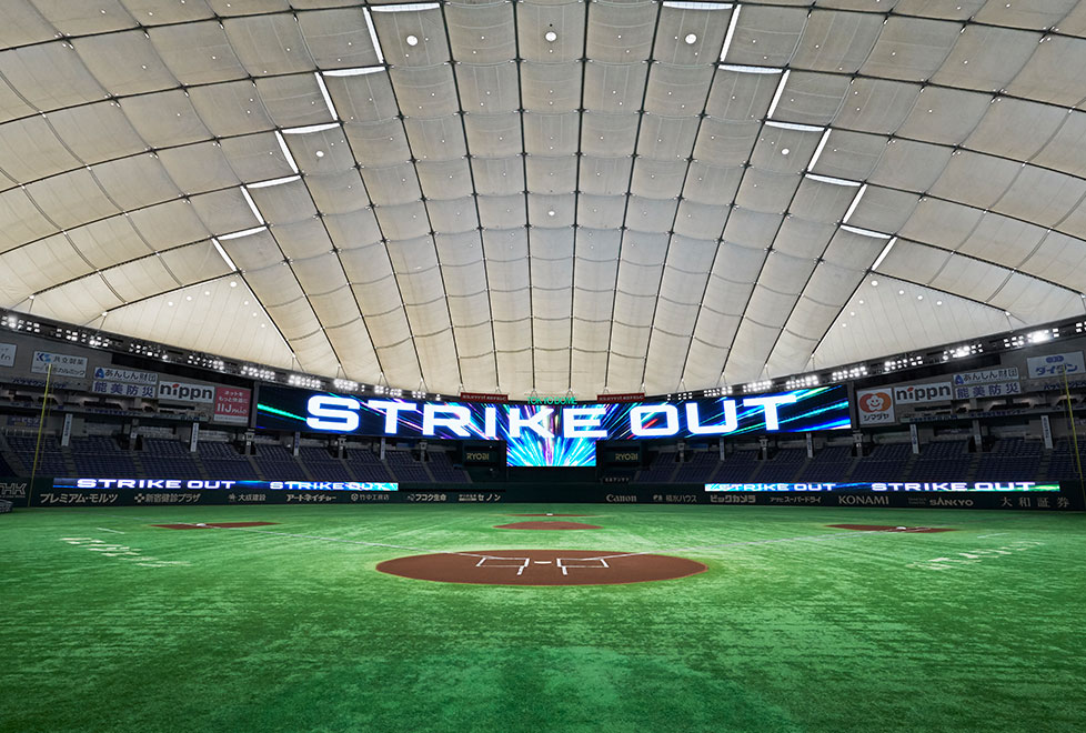 Ribbon board displays linked with LED floodlights and the giant video screen  
(pictured is the visual production for a strike out). 